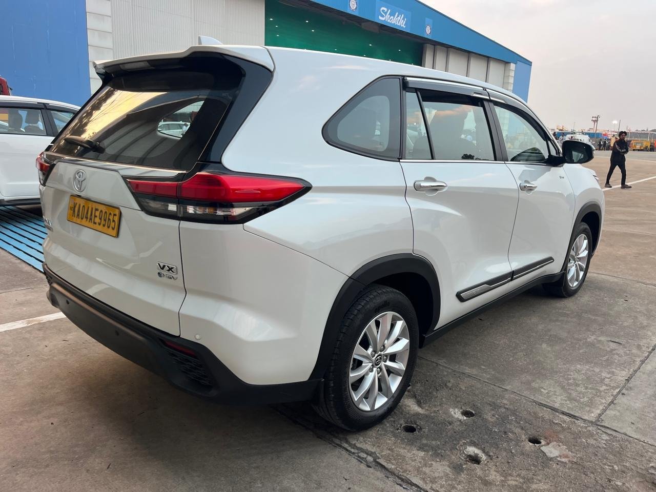 Toyota Innova Hycross side rear view cab